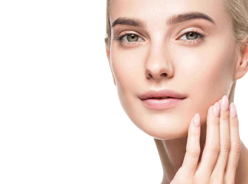 Woman with flawless skin after microneedling.